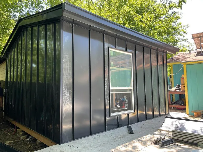 Black standing seam metal wall panels for Metal Roof Installation in Cottleville