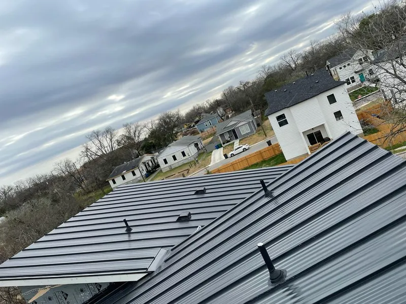 Standing seam metal roof panels with vents for Skylight Repair in Cottleville